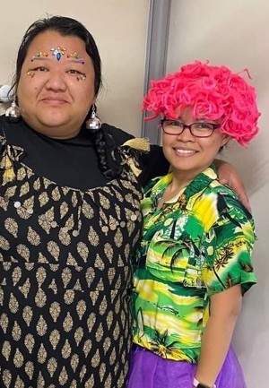 Pictured with a colleague - part of Sara's team, who she calls family