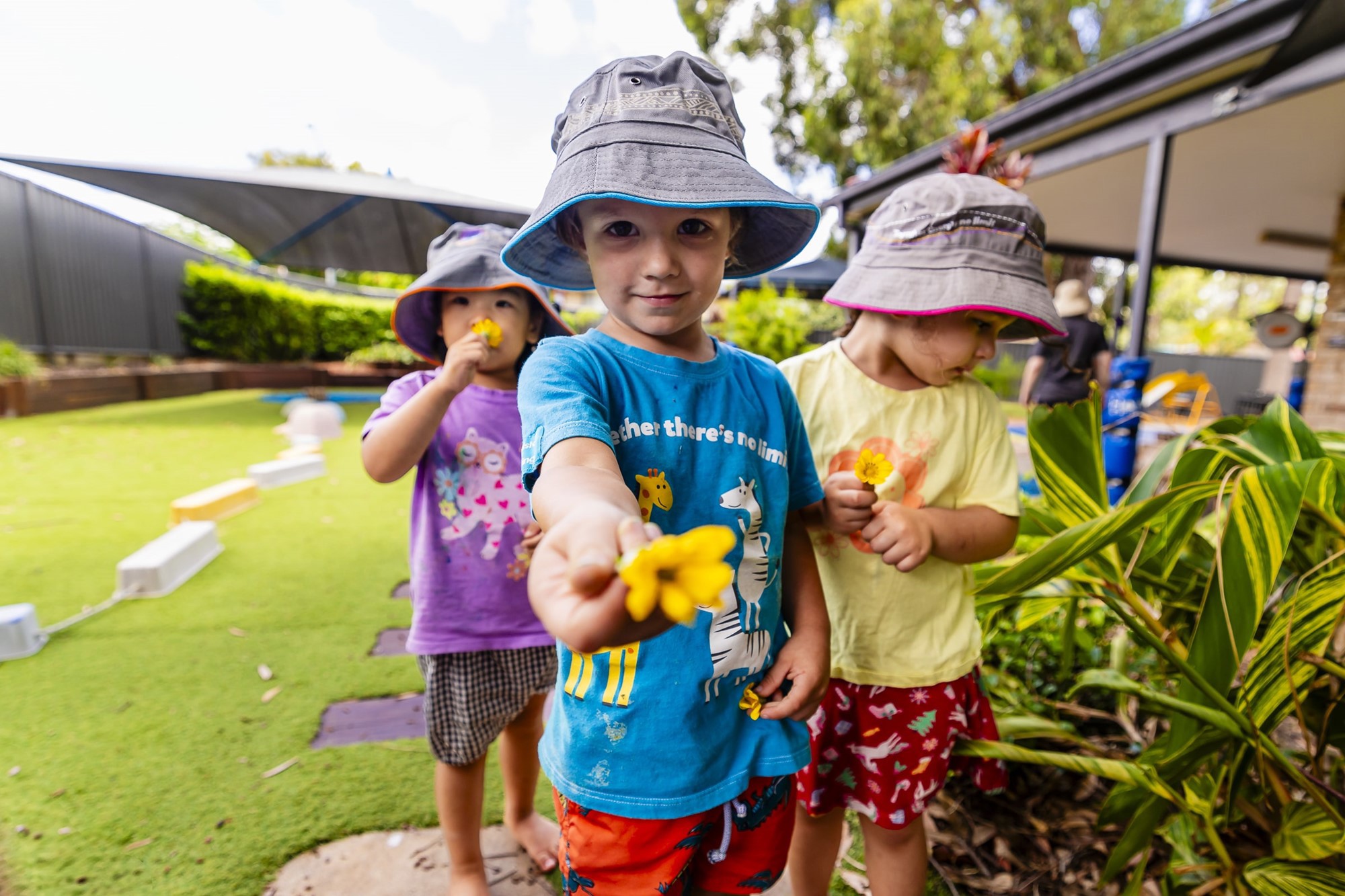goodstart-robertson-children-holding-picked-flowers-min.jpg